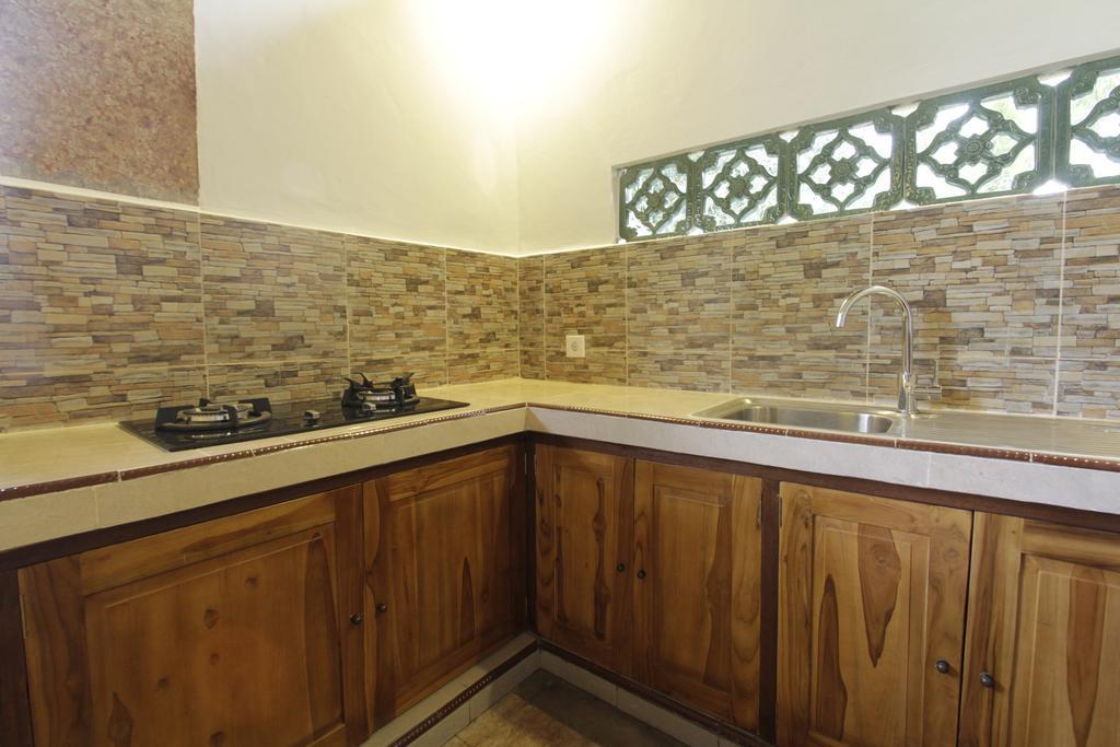Pekak Mangku Guest House Убуд Стая снимка